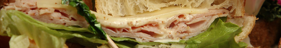 Eating Sandwich Cafe at Caffe Aroma restaurant in Newbury Park, CA.